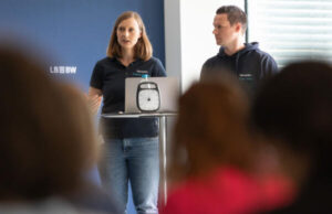 Vecoplan participates in the SDG Innovation Accelerator programme Friederike-Juraschek-and-André-Schell, two-of-the-young-Vecoplan-specialists-at-the-pitch-event.
