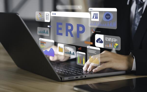 Businessmen use a computer corporate company management business Internet Technology to document management for ERP. Enterprise resource planning concept. Wolters-Kluwer-Tax-Accounting_Arca-Gestione-Document