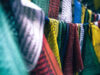 Progetto di raccolta dei rifiuti tessili in negozio grazie a Erion Textiles