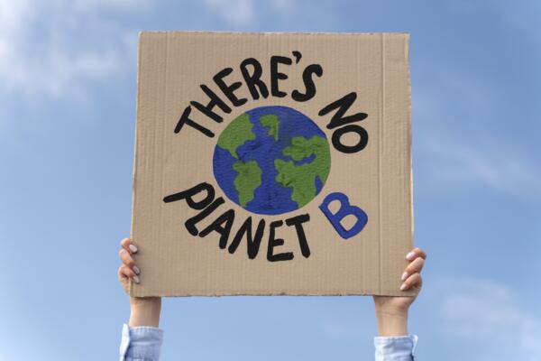 person-protesting-climate-change earth overshoot day